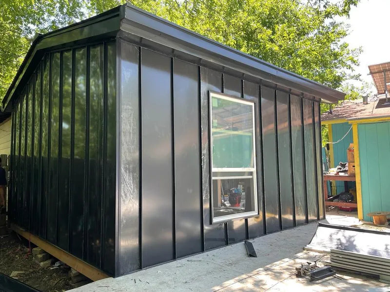 Black standing seam metal wall panels for Metal Roof Installation in Webster